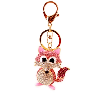 Sparkling crystal fox keychain with pink gradients and gold hardware on white background