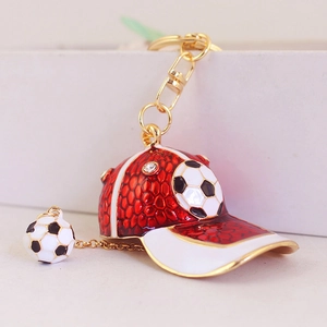 Creative baseball cap keychain with red white enamel football patterns and small rhinestones