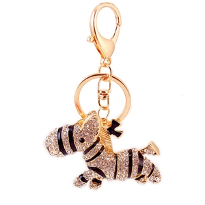 Creative zebra keychain pendant with gold plating, black enamel and sparkling rhinestones