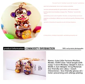 Detail view of cartoon monkey keychain with dimensions 11.6cm length and 47.1g weight