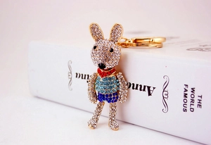 Detail of cute rabbit keychain featuring colorful rhinestones and gold alloy metal plating