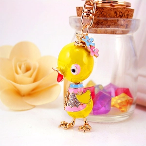 Cute yellow enamel duck keychain with sparkling crystals and rose gold metal clip for bags