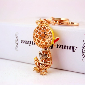 Creative sparkling hollow lucky clover little yellow duck metal keychain for women bags