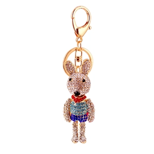 Cute long-eared rhinestone rabbit keychain with colorful stripes on gold metal base