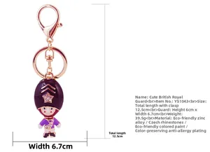 Detailed view of Royal Guard keychain with purple enamel finish and sparkling crystals