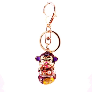 Cute golden zodiac monkey keychain with purple enamel, pearls and Fu character
