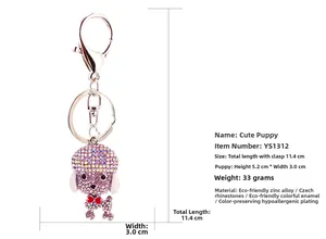 Detail view of purple rhinestone dog keychain with dimensions 5.2cm by 3.0cm