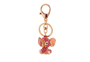 Close-up of pink rhinestone elephant keychain with golden finish and lobster clasp detail