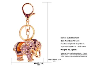 Detail view of elephant keychain with pink rhinestones and gold-tone lobster clasp