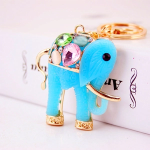 Creative elephant keychain with light blue resin, multi-colored gems and gold metal finish