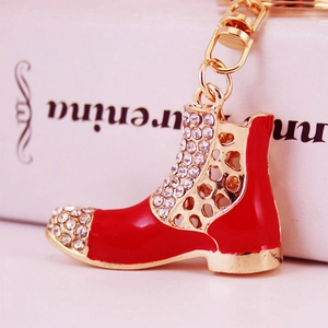 Portachiavi stivale rosso con cristalli, base in lega dorata e strass scintillanti