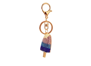 Close-up of golden ice cream keychain with colorful rhinestones and lobster clasp