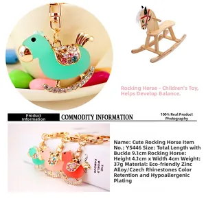 Detail of cute crystal rocking horse keychain with vibrant rhinestones and zinc alloy