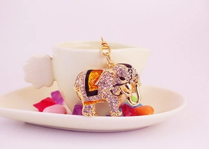 Detailed macro view of an elephant keychain with sparkling rhinestones and lobster clasp