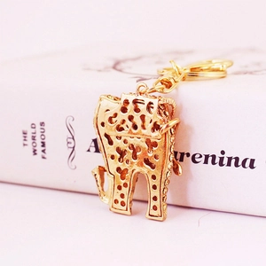 Golden elephant alloy keychain with rhinestone animal charm for handbags and keys