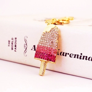 Cute gold popsicle keychain with gradient pink rhinestones and a lobster clasp for bags