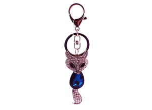 Détail du porte-clés renard en cristal avec gemme bleue et fermoir mousqueton en or rose