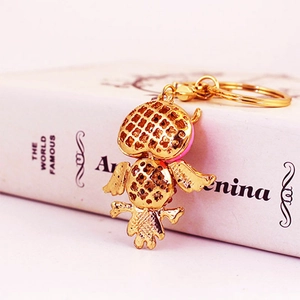 Cute gold owl keychain with colorful rhinestones and textured metal for handbags