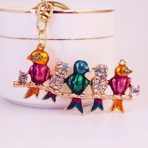Charming crystal-encrusted bird branch keychain with colorful enamel for women accessories