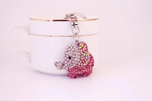 Close-up of pink crystal elephant keychain with shimmering rhinestones and lobster clasp