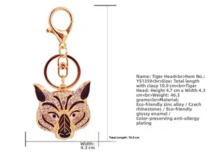 Detailed view of rose gold tiger head keychain with purple rhinestones and sizing metrics