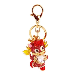 Süßer Drachen Schlüsselanhänger in Gold mit rosa Strasssteinen und klarem Schmuckstein