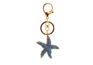 Détail du porte-clés étoile de mer bleue avec cristaux et fermoir mousqueton doré
