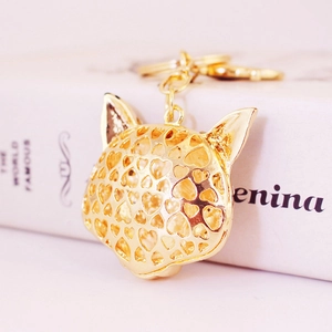 Golden hollow heart fox head keychain pendant for bags with elegant hollowed-out design