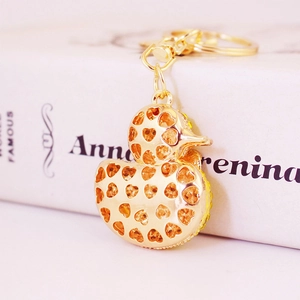 Funkelnder gelber Strass-Enten-Schlüsselanhänger mit goldenem Herz-Design und Ring