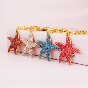 Porte-clés Étoile de Mer Mignon Strass Étincelants Alliage de Zinc Thème Océan Charme de Sac pour Femmes Accessoire Clé Voiture