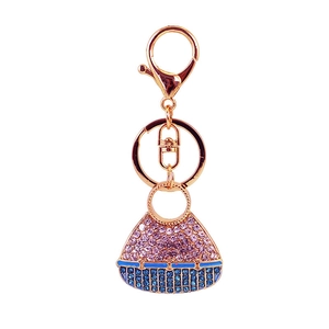 Sparkling crystal handbag keychain accessory with pink and blue rhinestones and gold plating