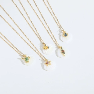 Gouden schelpketting set met fonkelende zirkoon zeedieren en maritieme bedels