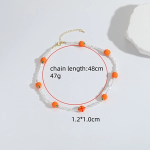 Modieuze kralenketting met witte parels en oranje kaki-hanger voor dames sieraad