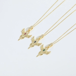 Collana con ciondolo ala di fenice vintage in oro con pietre rosse, blu e verdi