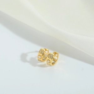 Elegant gold-plated hoop earrings featuring white zircon inlay and hollow heart details