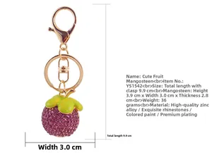Détail du porte-clés mangoustan avec strass, dimensions 9,9 cm de long et poids de 36 g