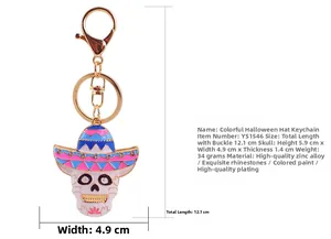 Detail of colorful rhinestone skeleton keychain with Mexican hat and golden metal ring