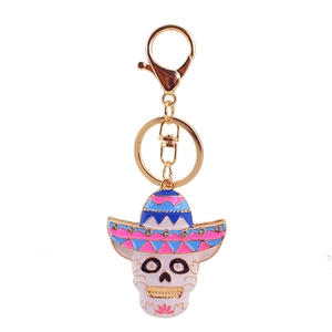 Colorful Mexican sugar skull keychain with sombrero and rhinestones on gold ring