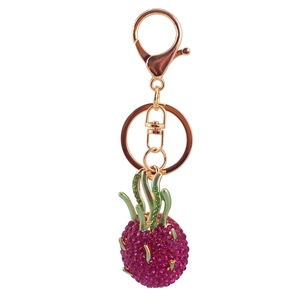 Sparkling tropical dragon fruit keychain with magenta crystals and gold plating