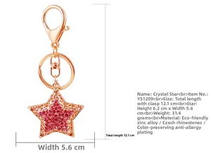 Detail showing dimensions of the pink rhinestone star keychain with dimensions 12.1cm and 31.4g