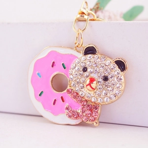 Cute rhinestone bear with pink donut keychain in gold-plated alloy for handbag charm