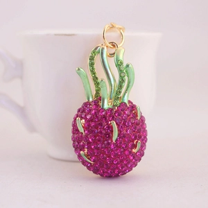 Sparkling tropical dragon fruit keychain with magenta rhinestones and gold ring