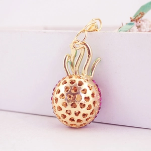 Golden hollow heart-shaped sphere pendant with pink rhinestones for keychains