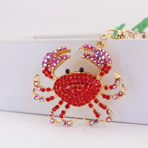 Porte-clés crabe scintillant avec strass rouges et fermoir mousqueton doré pour sac à main