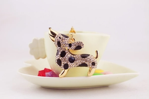 Detailed close-up of a rhinestone encrusted dachshund pendant on a golden keychain