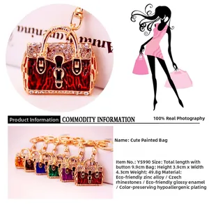 Detailed view of leopard print handbag keychain with zinc alloy and crystals