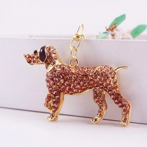 Golden keychain with a rhinestone pointer dog pendant and lobster clasp for handbags