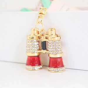 Portachiavi binocolo creativo dorato con strass scintillanti e dettagli in smalto rosso
