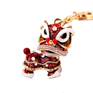 Porte-clés de danse du lion chinois avec émail rouge et strass sur métal doré