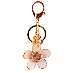 Sparkling daisy flower keychain with white enamel petals and colorful rhinestones